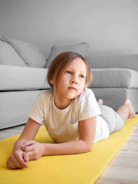 Little girl on mat