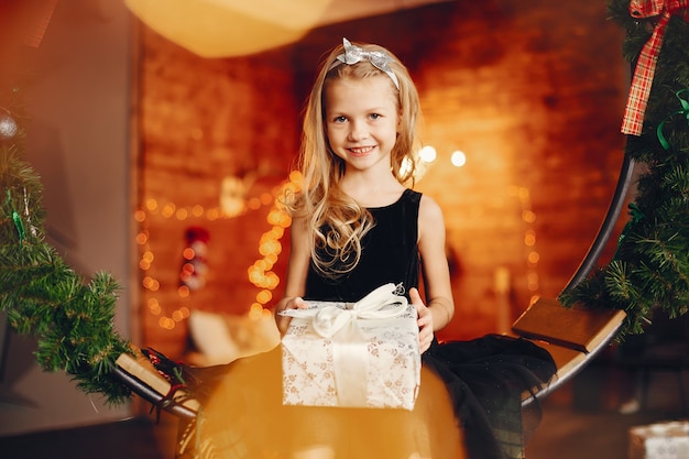 Little girl near in a black dress