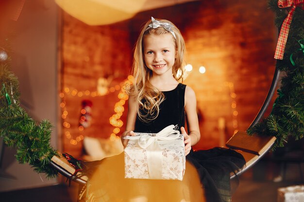 Little girl near in a black dress