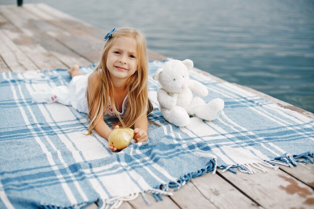 Little girl near lake