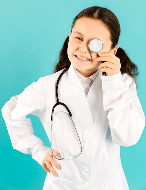 Free photo little girl posing with stethoscope