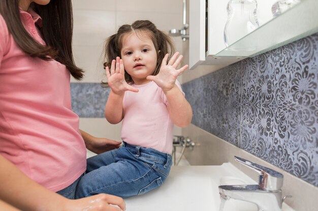 Little girl showing clean hands