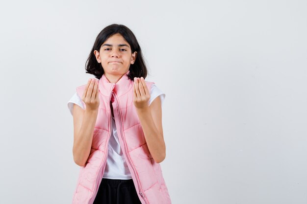 Little girl showing Italian gesture