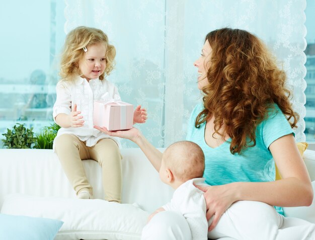 Little girl taking a present