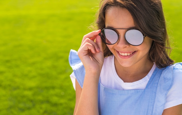 Little girl wearing sunglasses