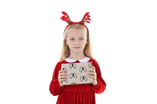 Little girl with christmas box isolated on white background