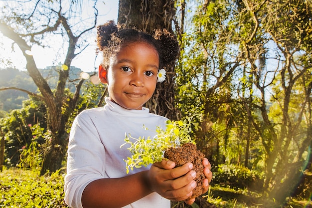 Little girl with flower