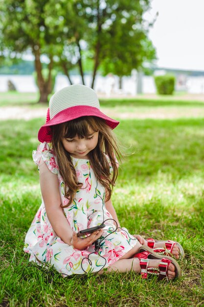 Little girl with a telephone