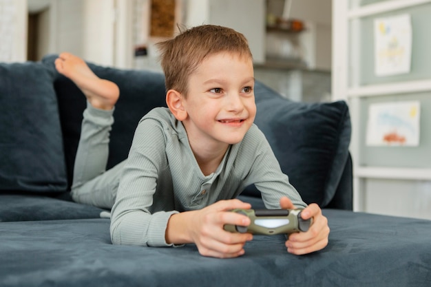 Little kid playing with a controller