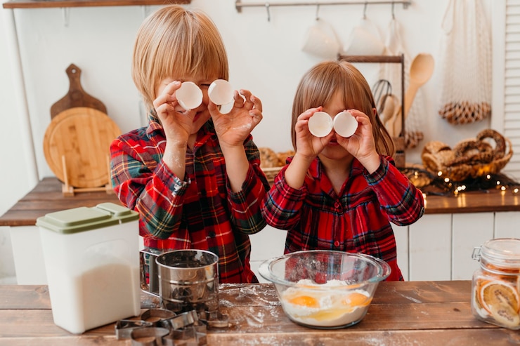 Free Photo little kids making christmas cookies