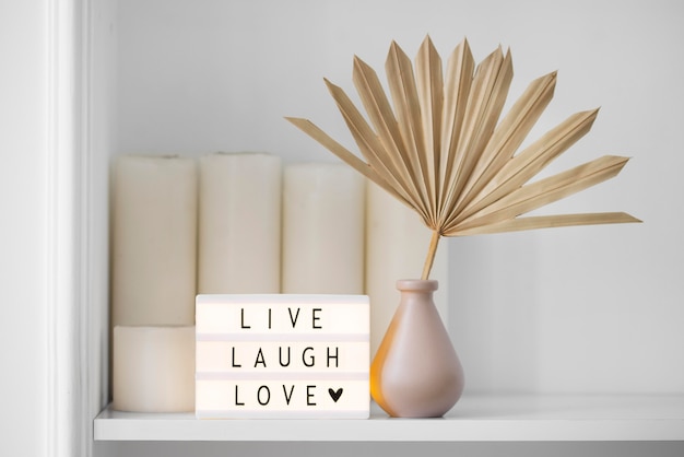 Live laugh love message on lightbox
