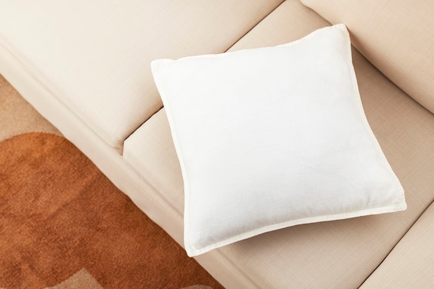 Free photo living room sofa cushion, minimal interior design