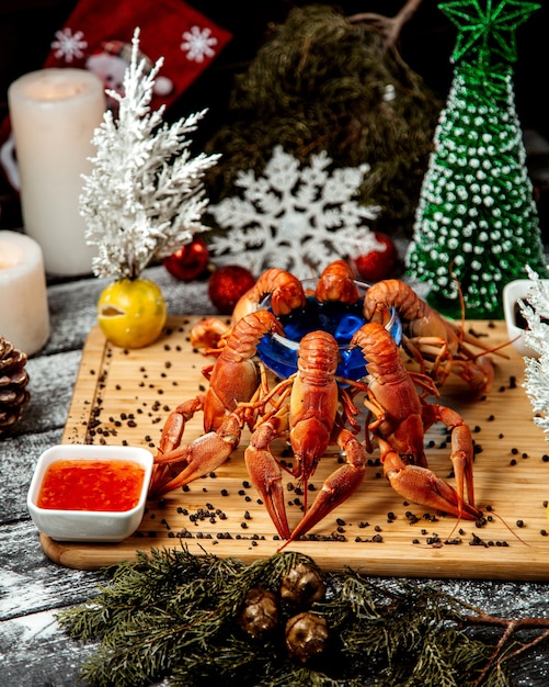 Lobster set with sweet chili on wooden desk