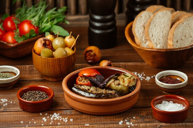 Local food, eggplant bell pepper and tomato dolma, stuffed with meat