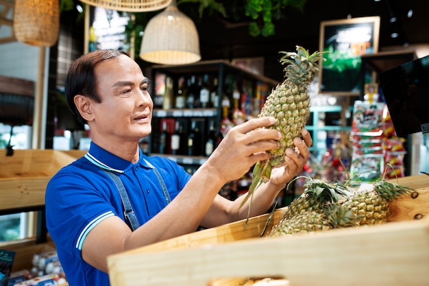 Free photo local retailer taking care of his business