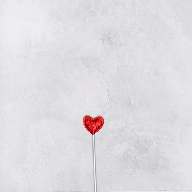 Lollipop in form of heart on wand