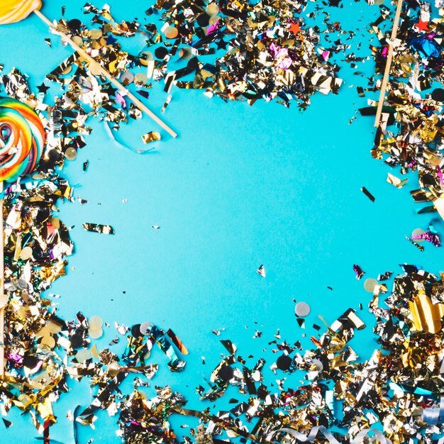 lollipops and confetti on blue