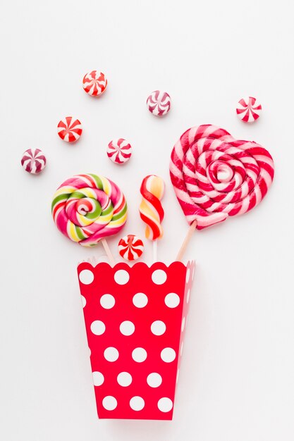 Lollipops and sweets in popcorn bag