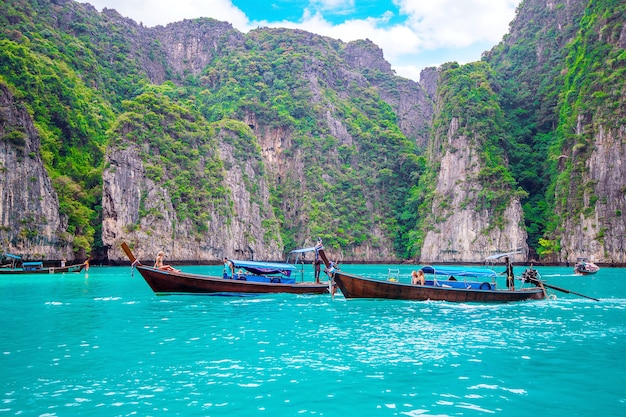 Long boat and blue water at Maya bay in Phi Phi Island, Krabi Thailand.