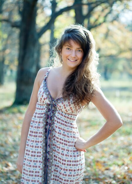 long-haired girl  in autumn