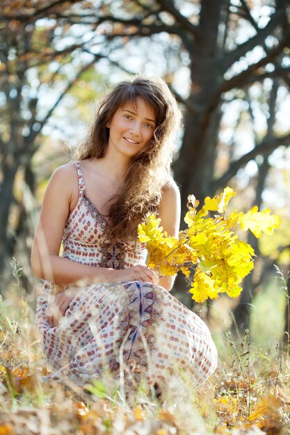 long-haired girl with oak posy