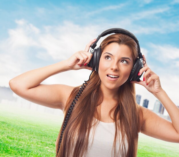 Long-haired woman in headphones