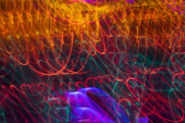 Free photo long orange gradient exposure neon lights texture