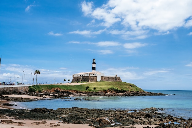 Long shot of Bahia Nautico Museum in Salvdor, Brazil, under cloudy blue skies