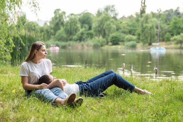 Long shot best friends relaxing in nature