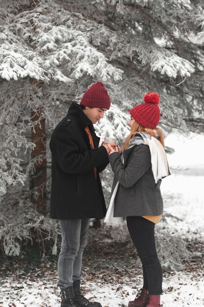 Long shot of couple holding hands