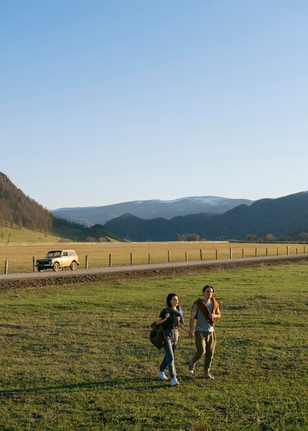 Long shot couple spending time in nature