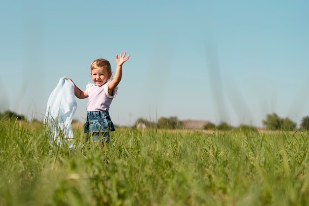 Long shot of a little girl looking away