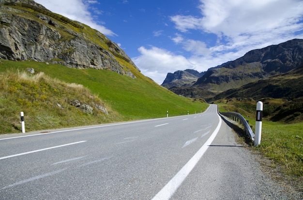 Long shot of a scenic highway surrounded by mountains