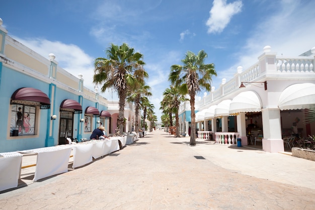 Long shot of street in tropical tourist resort