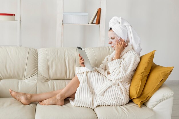 Long shot of woman in bathrobe