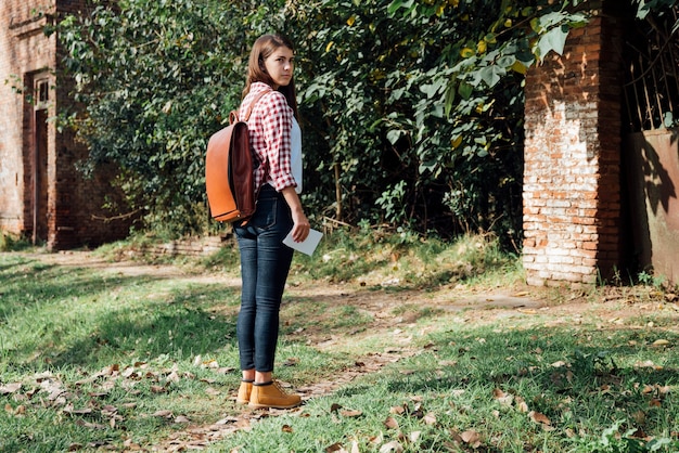 Long shot of woman looking over shoulder