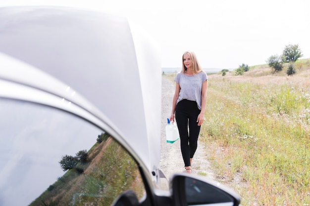 Long shot of woman on road