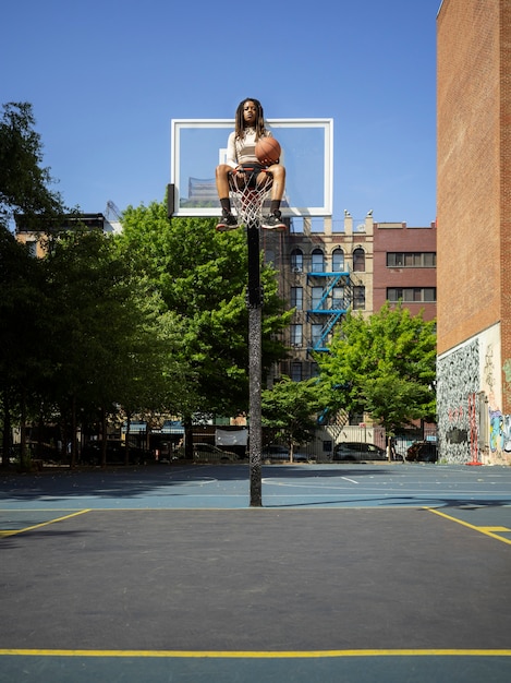 Long shot woman with afro dreadlocks