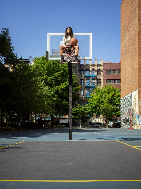 Long shot woman with afro dreadlocks