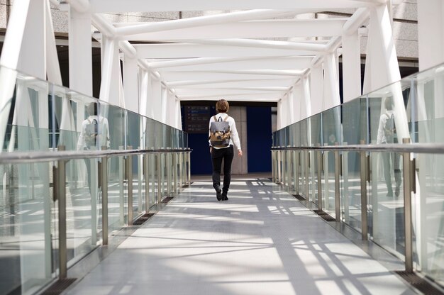 Long shot woman with backpack