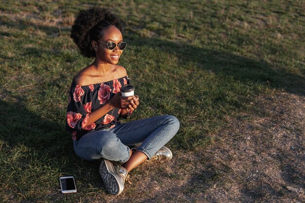 Free photo long show beautiful african woman looking away