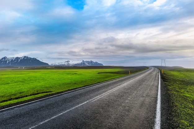 long straight road and blue sky.