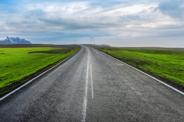 long straight road and blue sky.