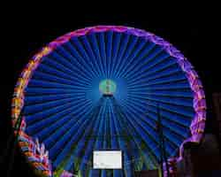 Free photo long view warm colors wonder wheel in the night