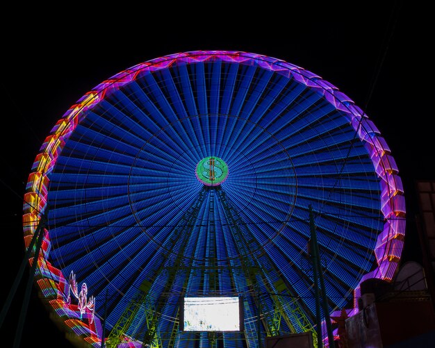 Long view warm colors wonder wheel in the night