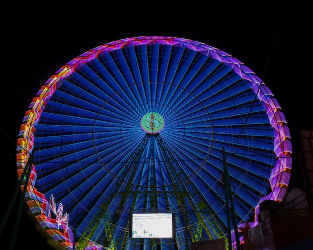 Long view warm colors wonder wheel in the night