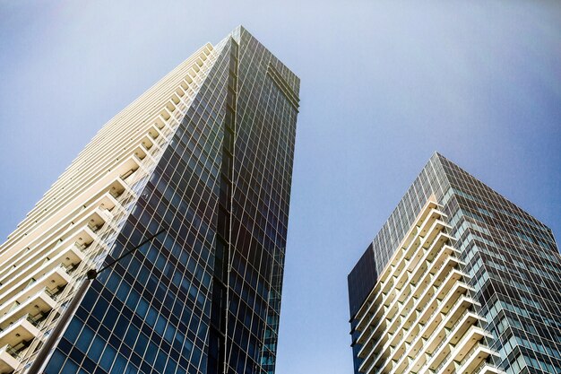 Look from below at futuristic buildings of gorgeous Dubai under