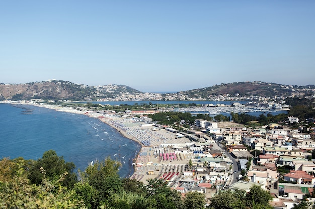 Look from above at sunny Naples on the shore