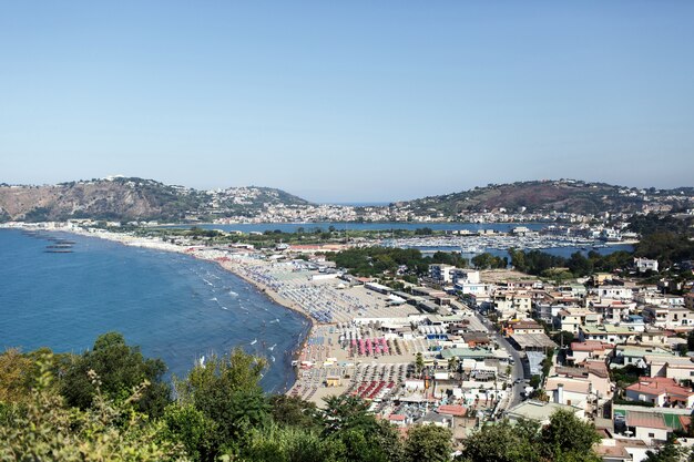 Look from above at sunny Naples on the shore