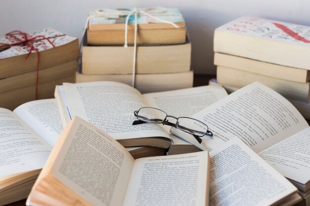 A lot of books on the table